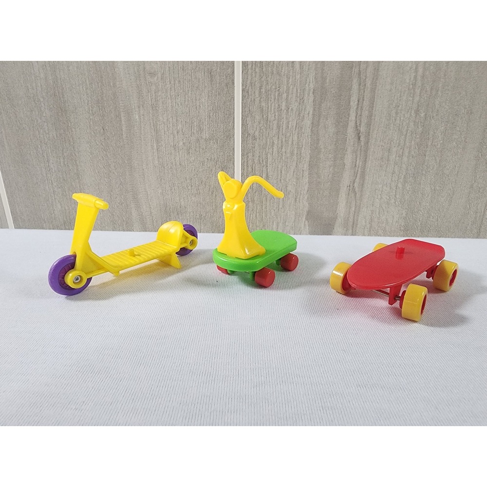 Vintage 1980s McDonalds Happy Meal Lot Garfield Muppet Babies Scooter Skateboard